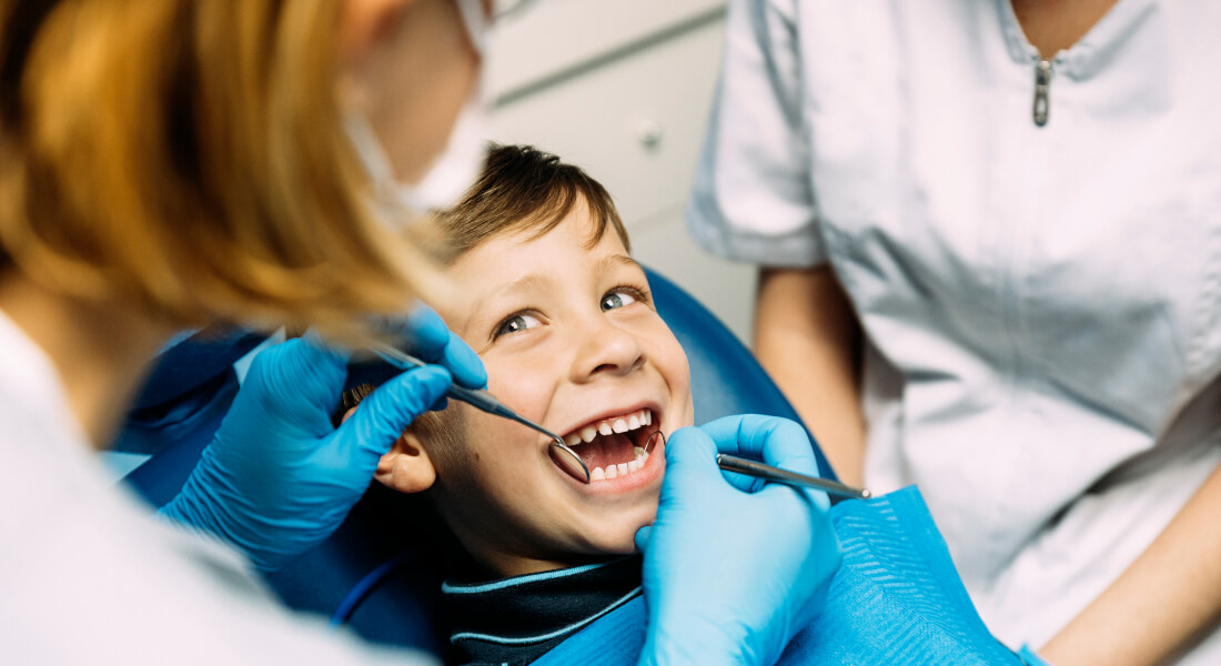 Smiling child in the dentist's chair