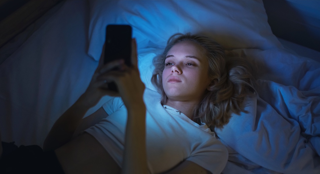teenager in bed