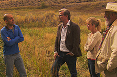 Shane Doyle (left) telling Eske Willerslev, Sarah Anzick and Larry Lahren about the history of the land. (Photo: Linus Mørk).