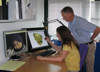 Resaerchers analyzing CT scans of Inca mummies.